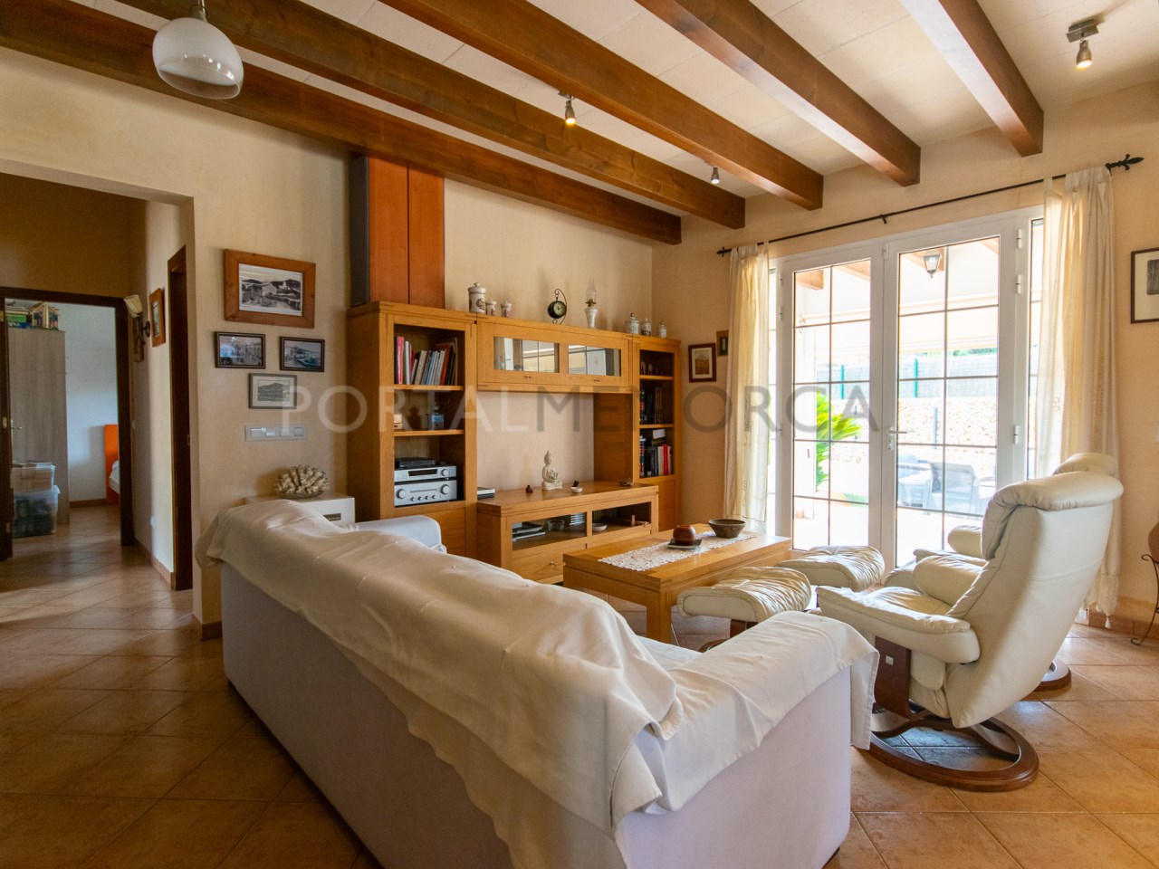 Living room of a Menorcan house with pool and garage in Mercadal