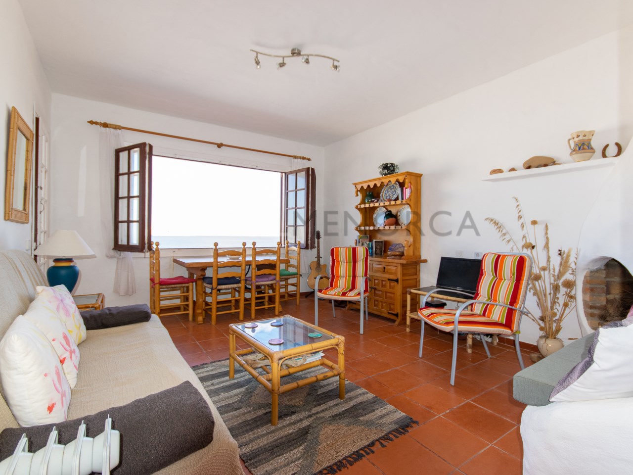 Living room in partment with sea views in Playas de Fornells