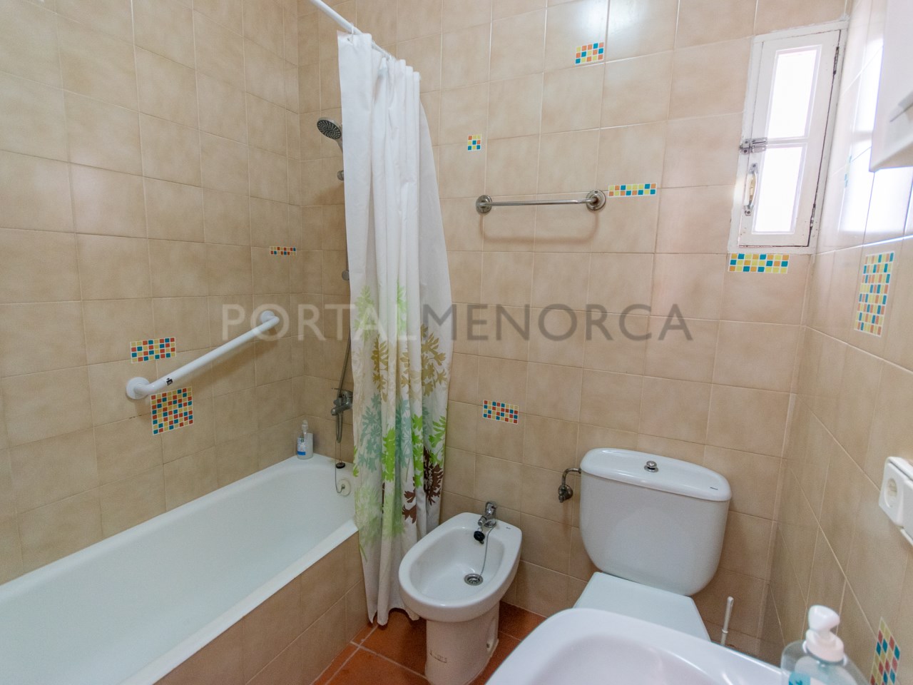 Bathroom of partment with sea views in Playas de Fornells