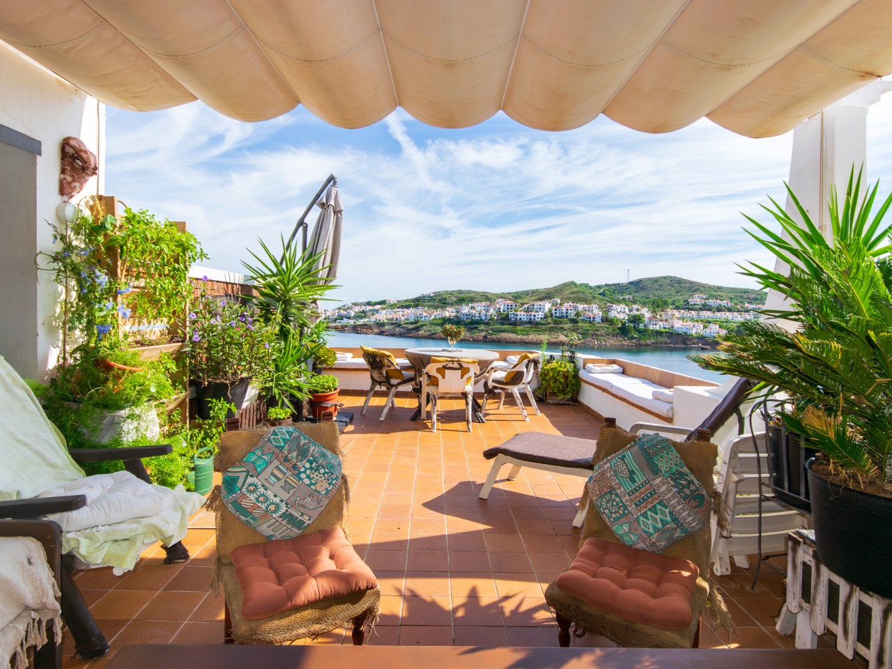 Terrace of 3 bedroom apartment with magnificent views of Cala Tirant and Fornells Beaches