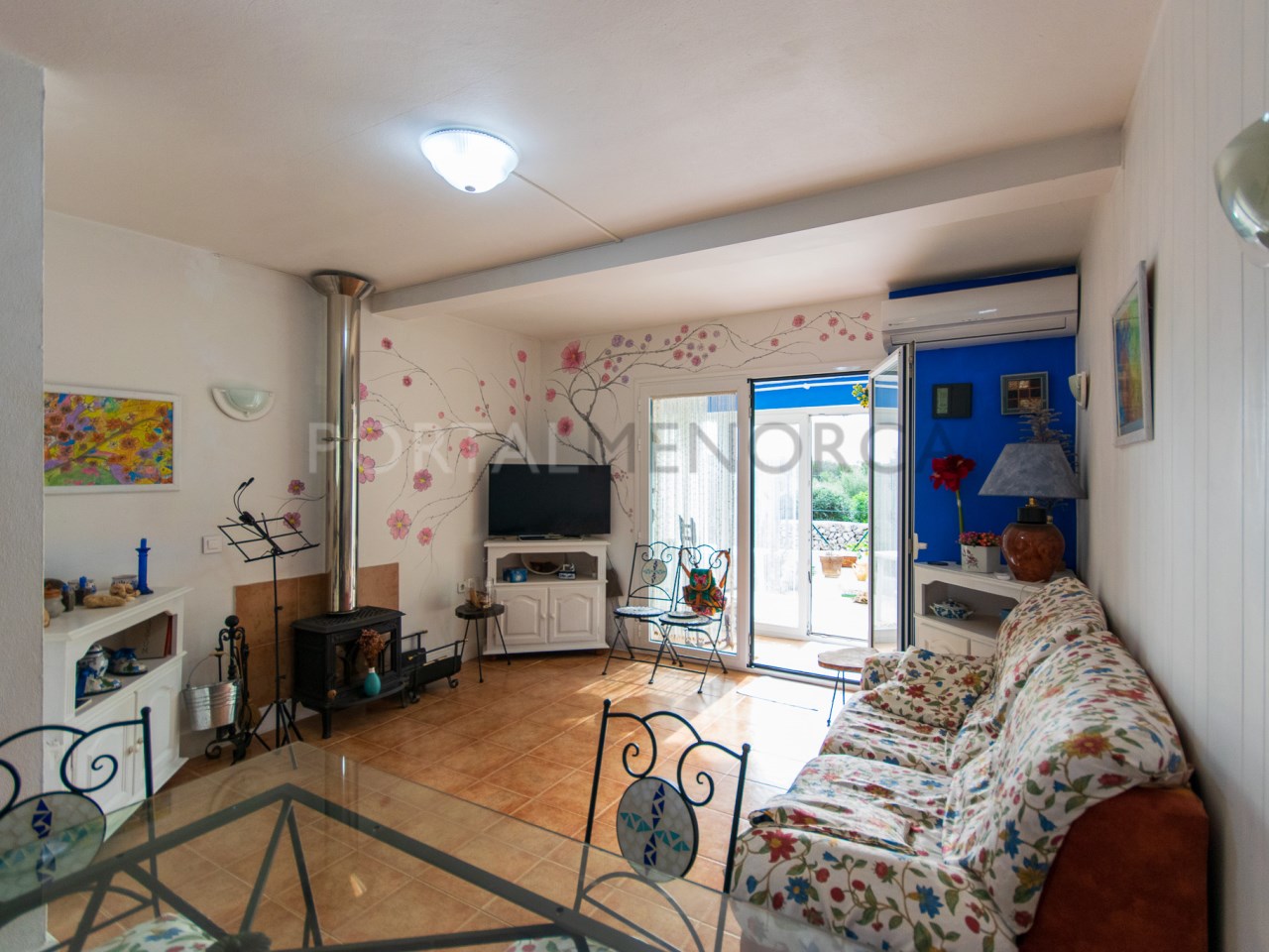 Living-dining room of two-bedroom townhouse for sale in Cales Coves