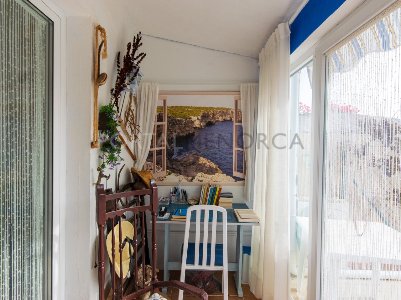 Veranda of two bedroom townhouse for sale in Cales Coves