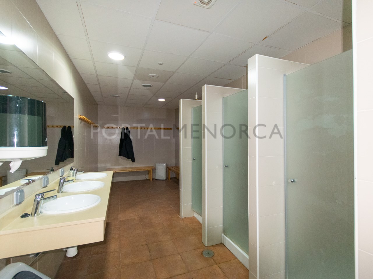Changing rooms in a building for sale in the village of Sant Lluis