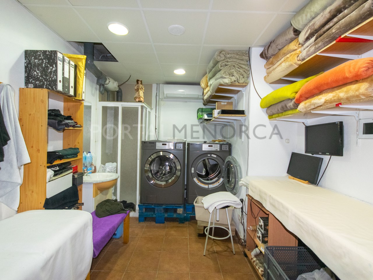 Zona lavandería en un edificio en venta en el pueblo de Sant Lluis