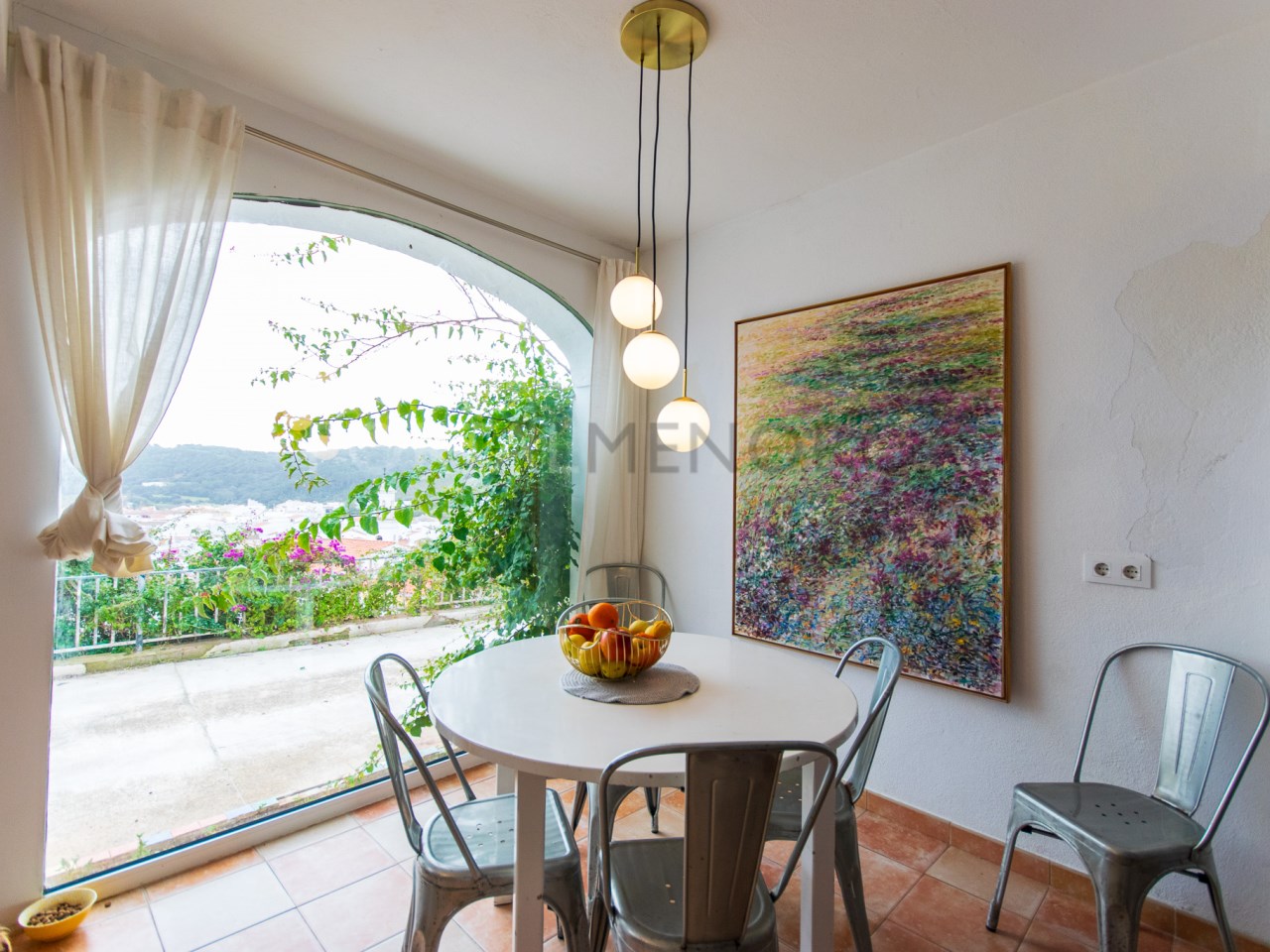 Dining area in charming house with grounds and views of the village of Ferreries