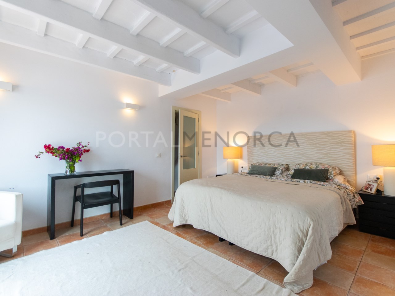 Room with terrace of charming house with land and views of the village of Ferreries