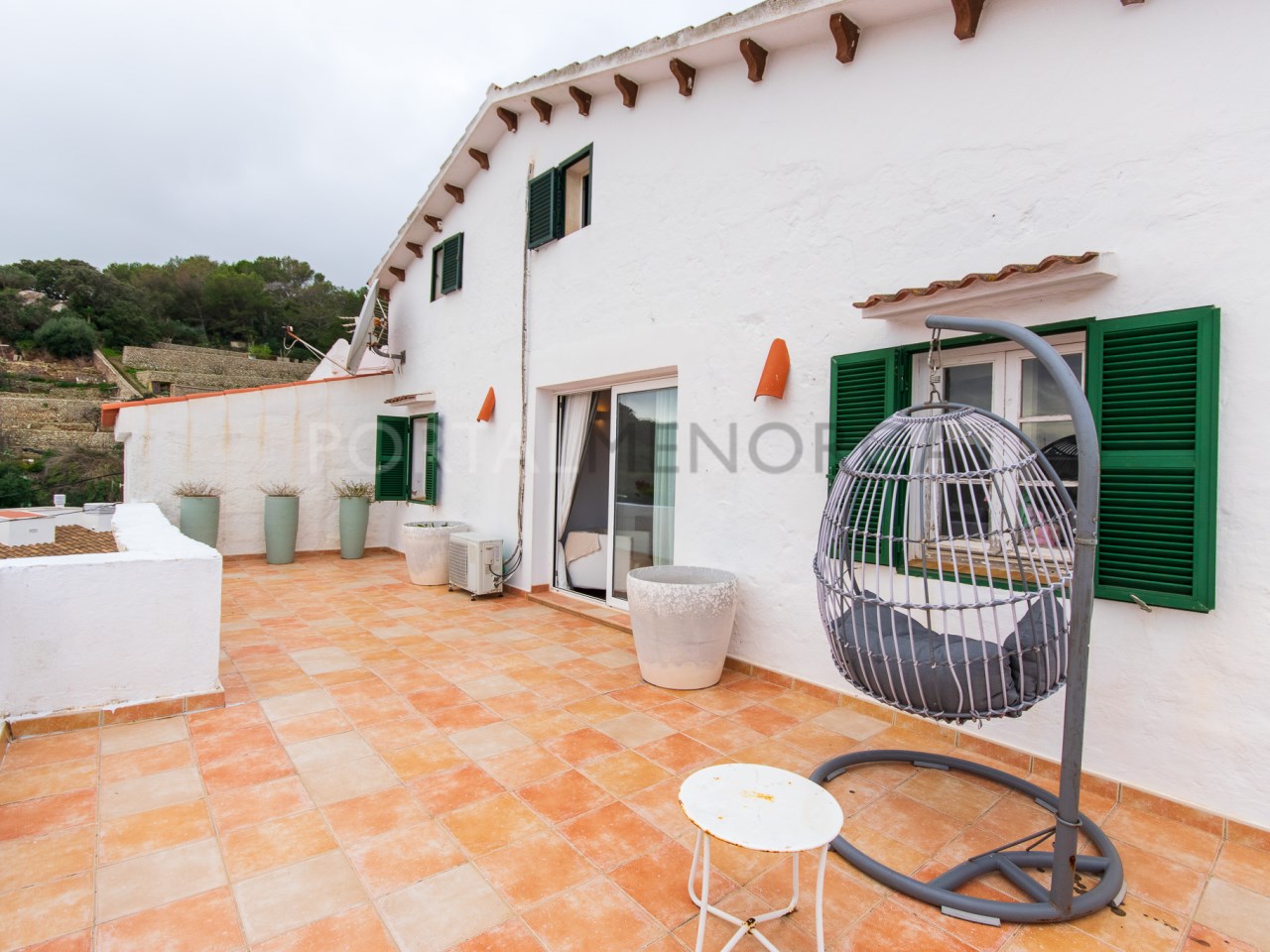 Private terrace of charming house with grounds and views of the village of Ferreries