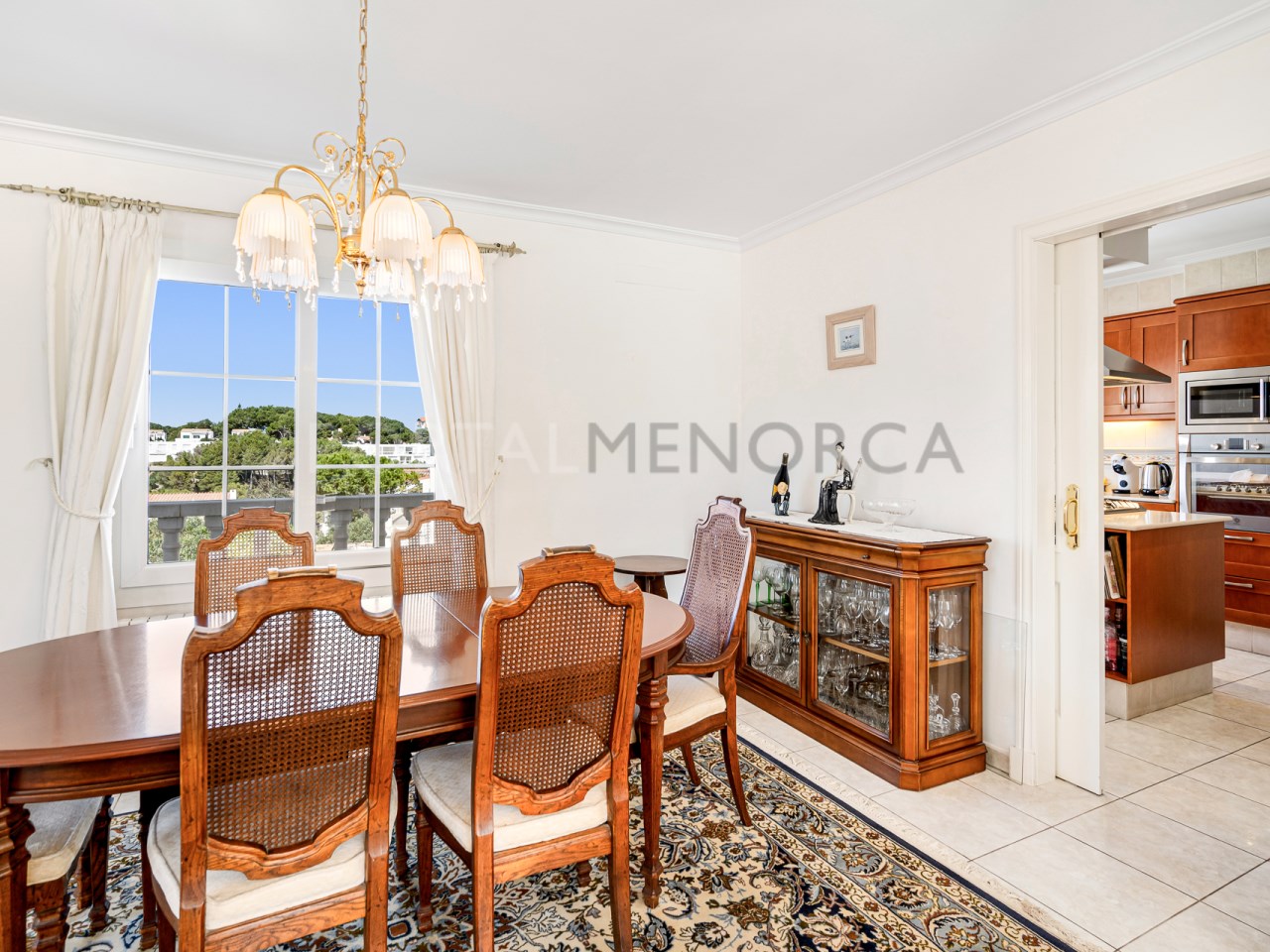 Dining room of detached villa with sea views in Addaia