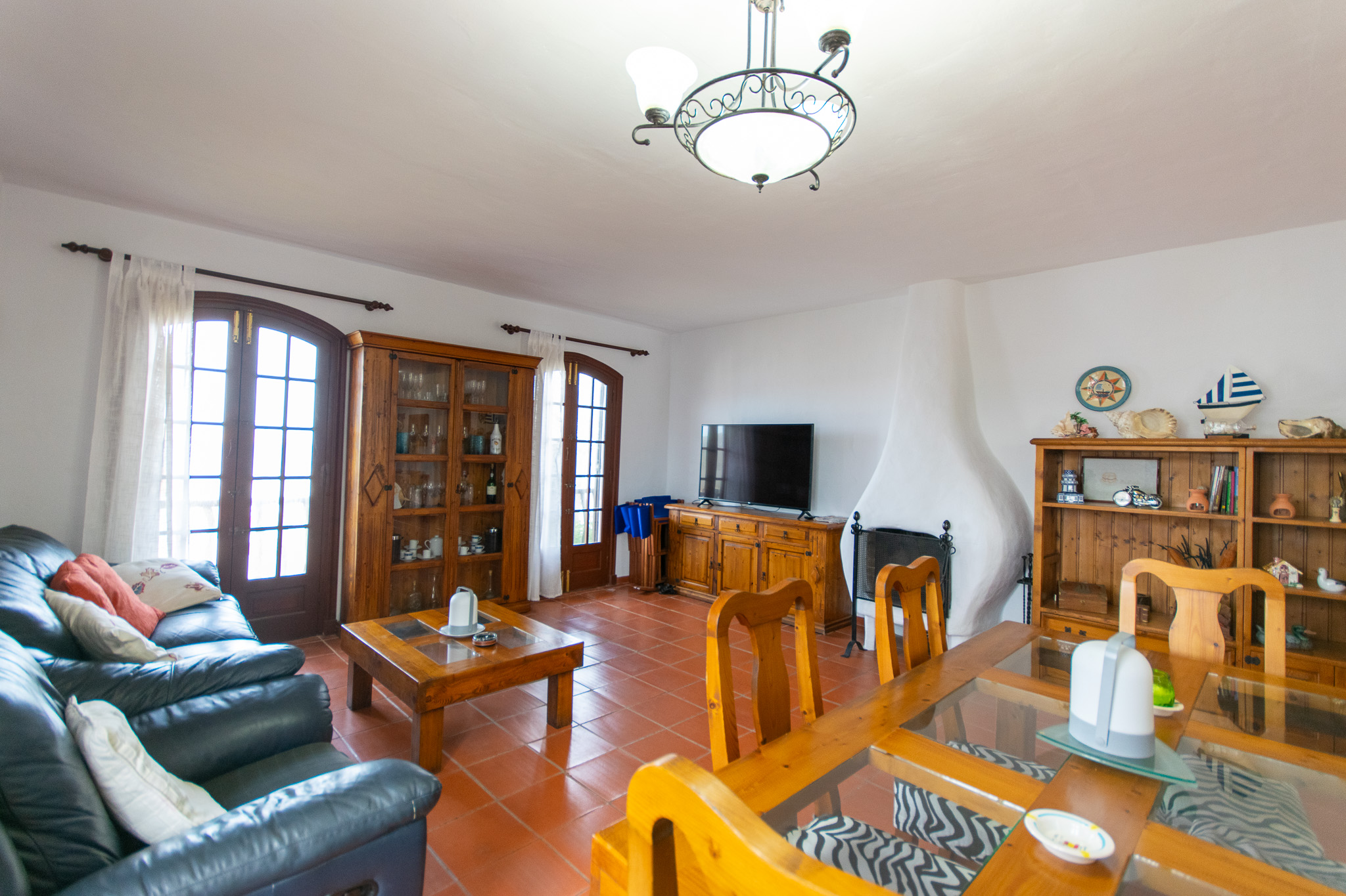 Living-dining room of a spacious flat with sea views and tourist license in Playas de Fornells
