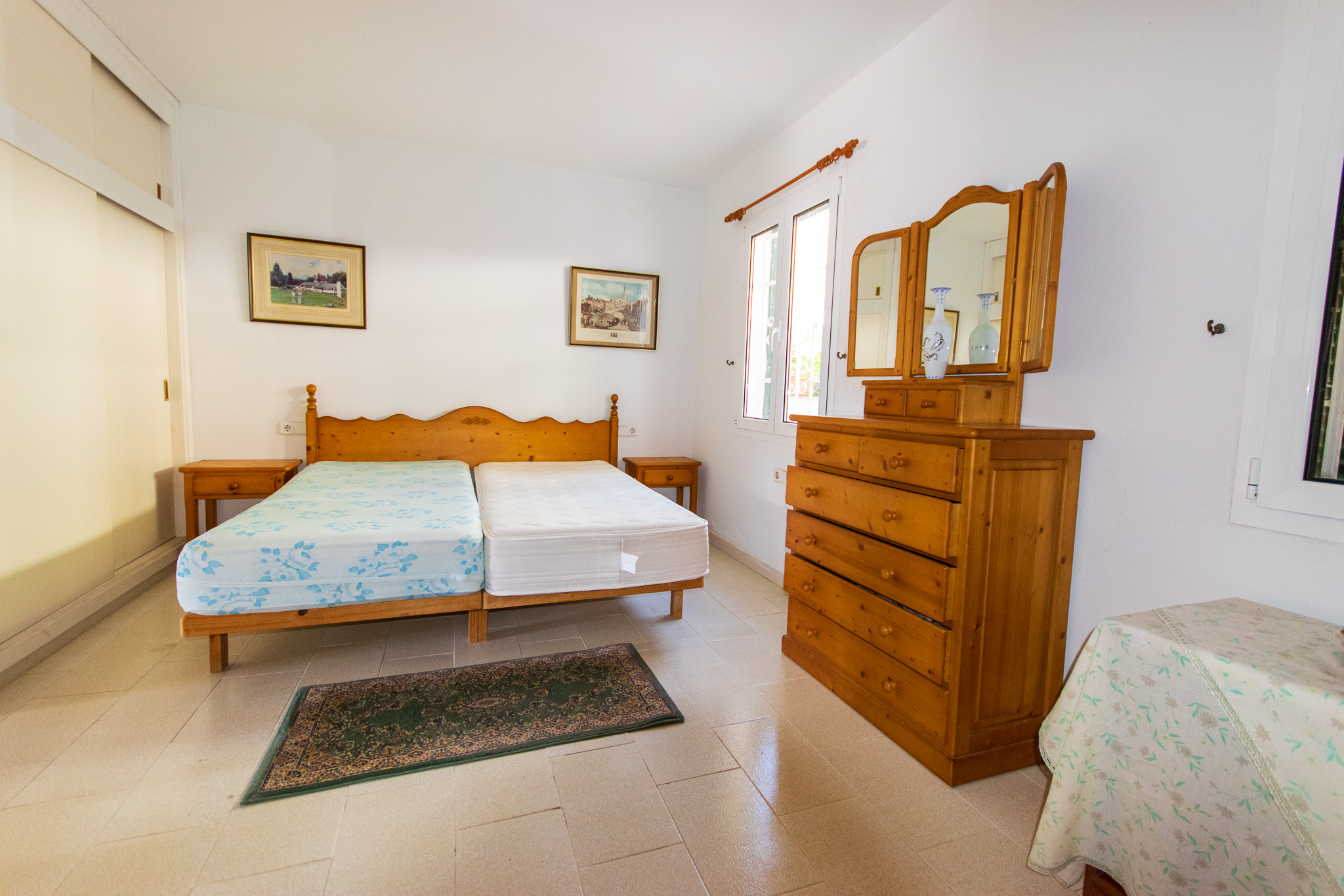 Bedroom with bathroom in duplex with good views in Cala Galdana