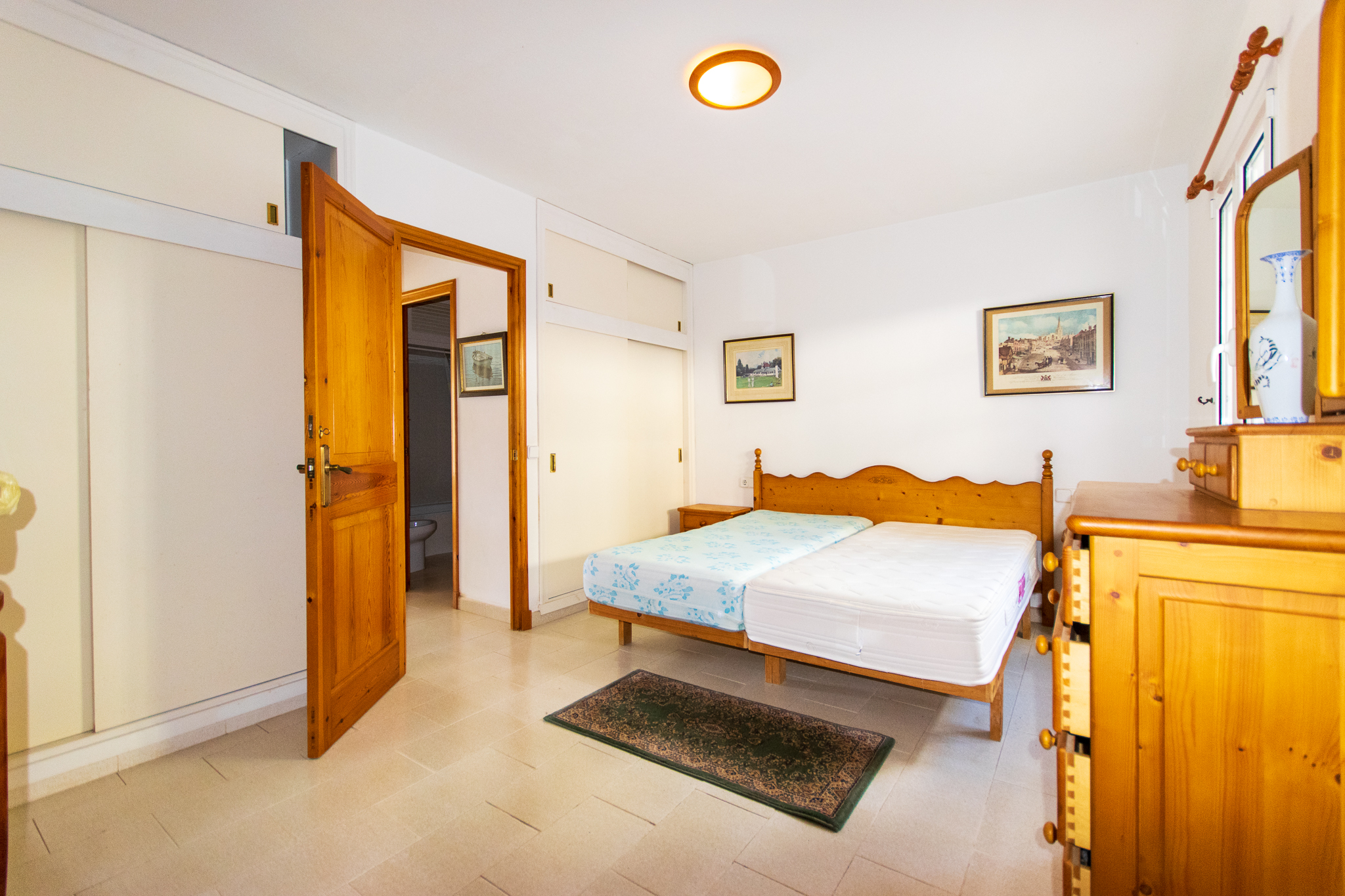 Bedroom with bathroom in duplex with good views in Cala Galdana