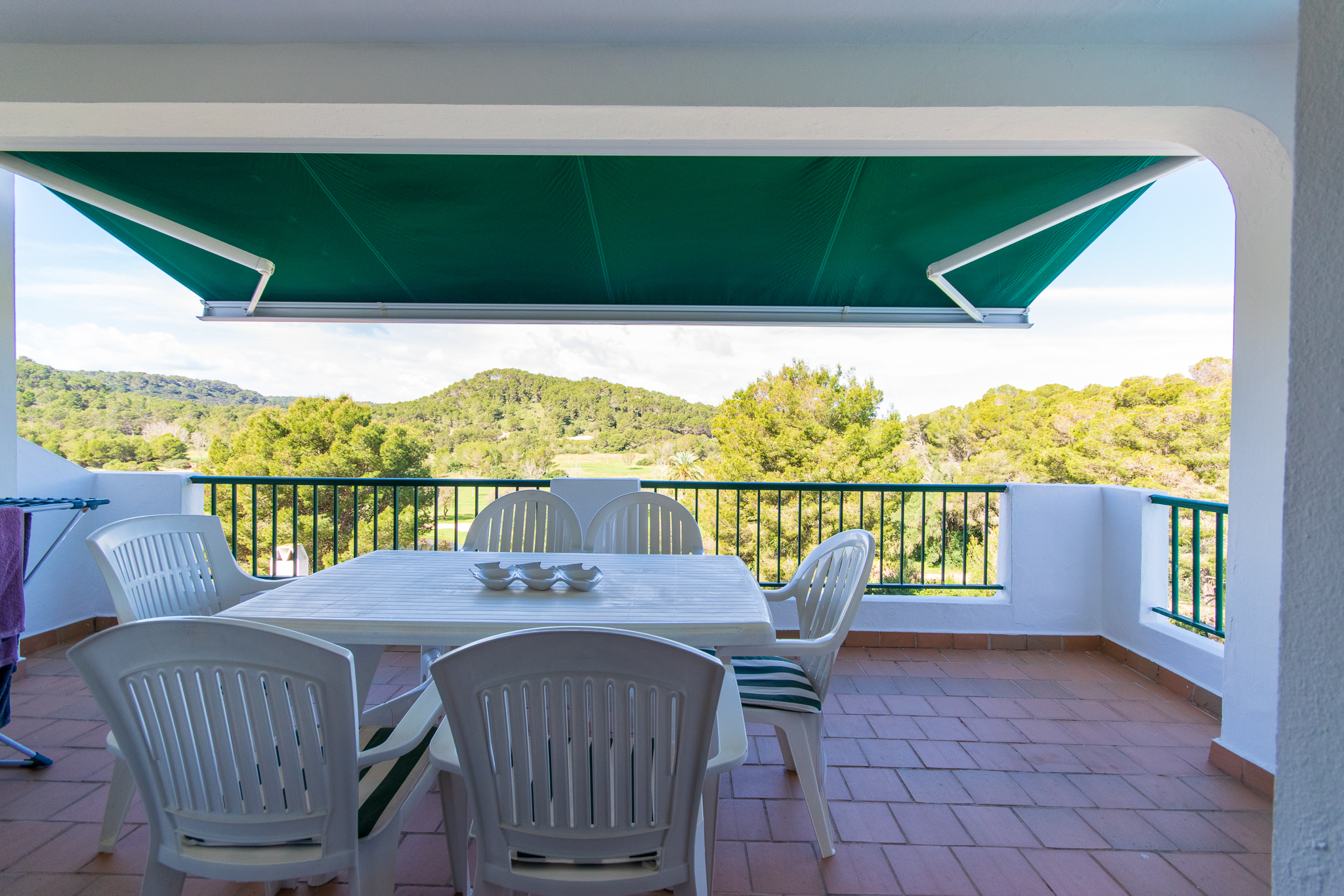 Terrace with awning of apartment with golf views in Son Parc