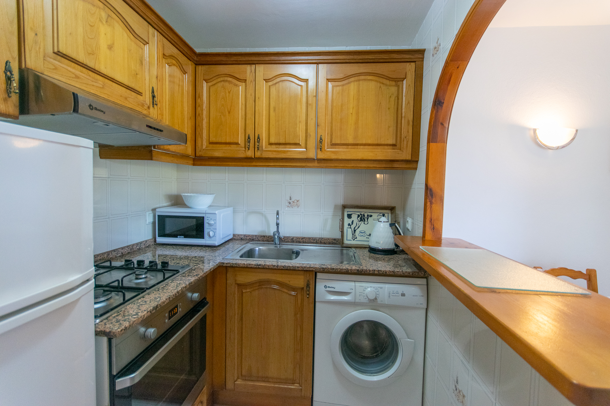 Apartment kitchen with golf views in Son Parc