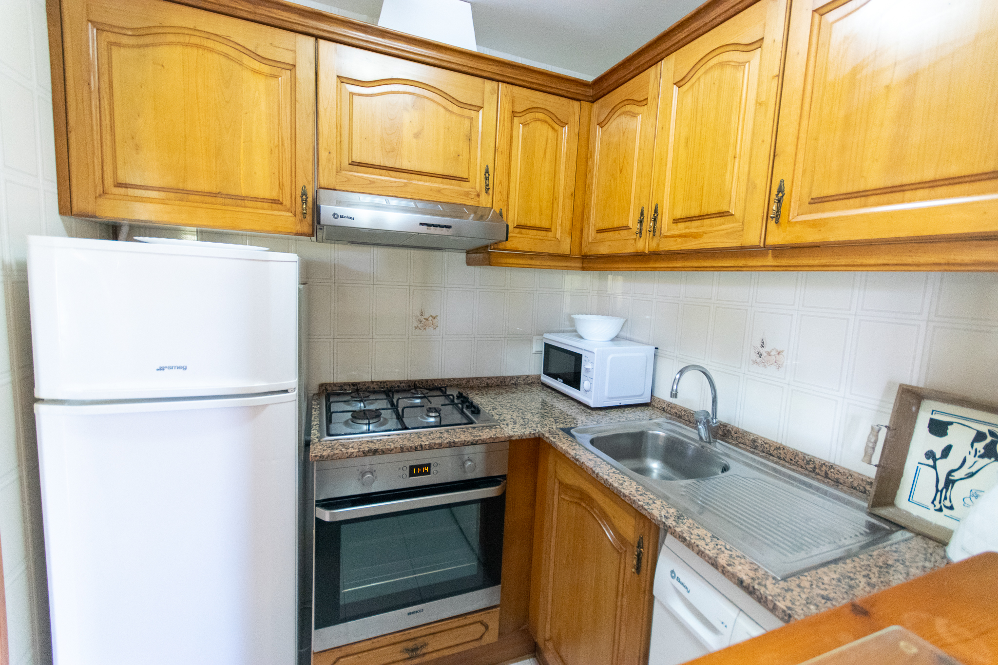 Apartment kitchen with golf views in Son Parc