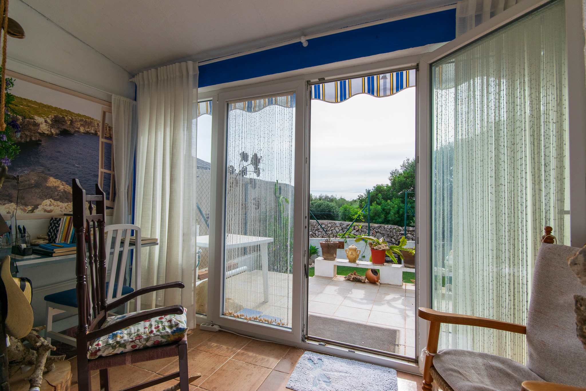 Veranda of two bedroom townhouse for sale in Cales Coves